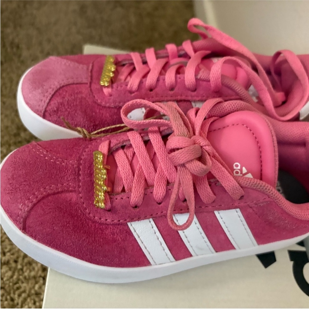 Adidas Pink Sneakers with White Stripes and Gold Details